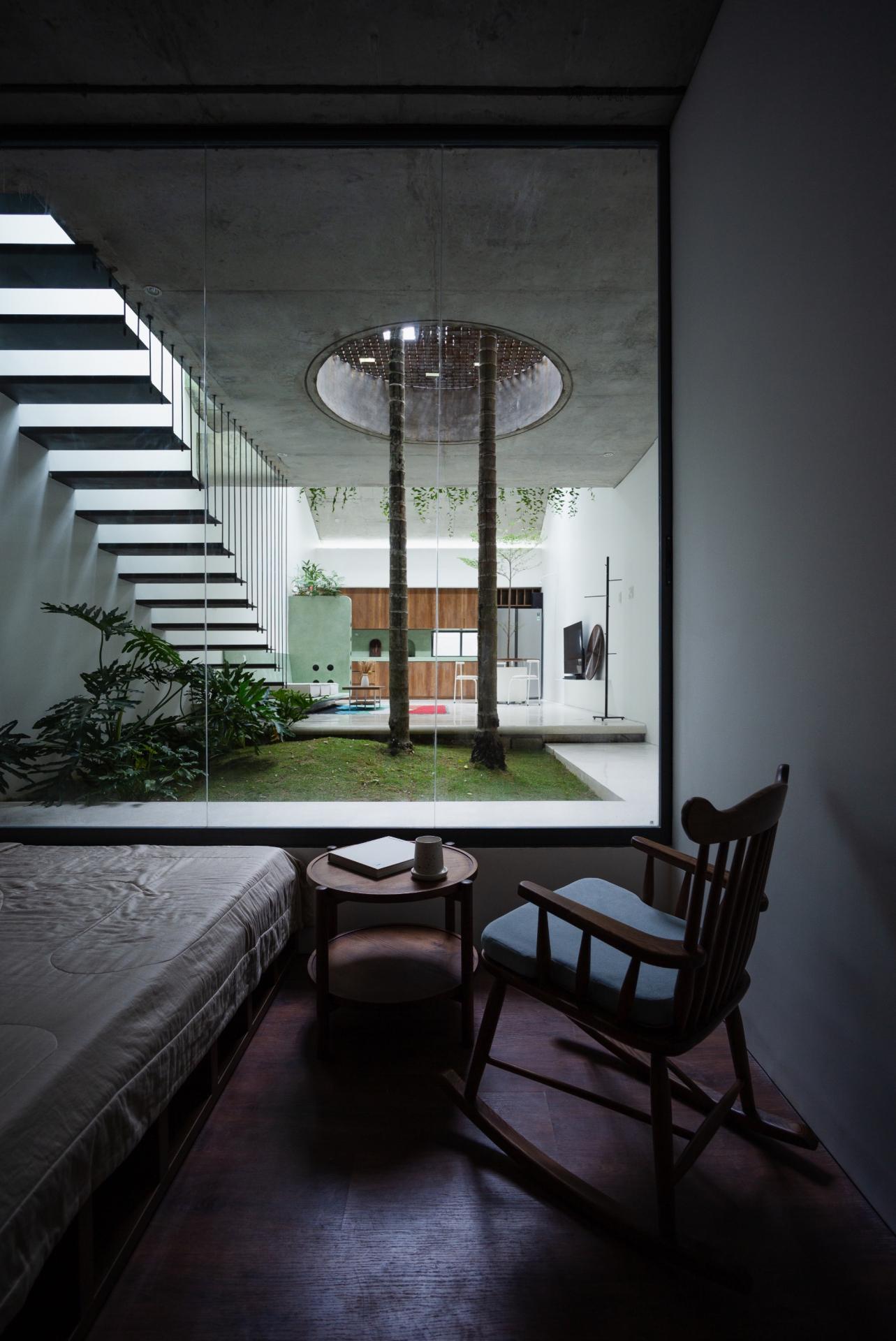 This home in Vietnam incorporates the essence of a botanical garden into its design