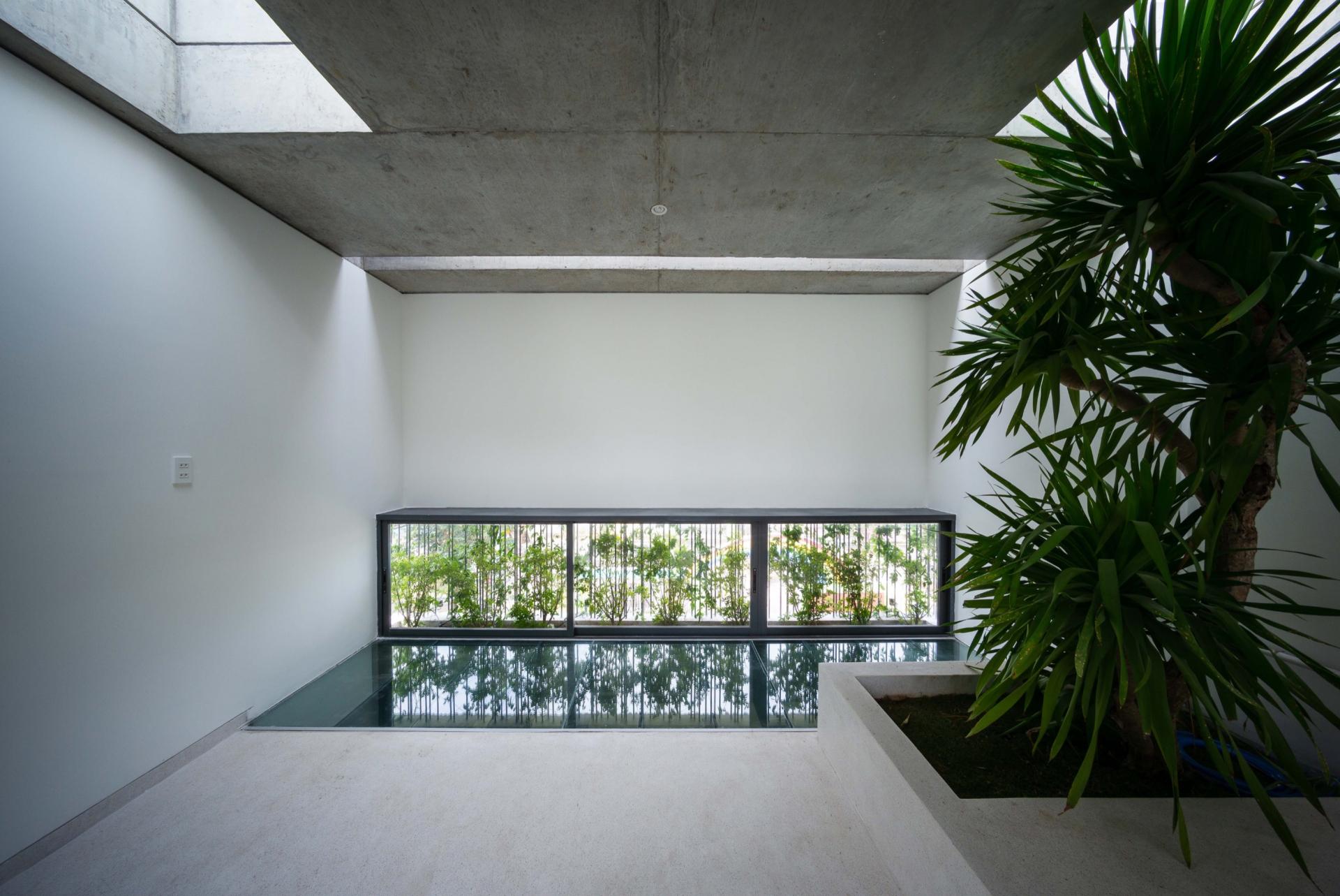 This home in Vietnam incorporates the essence of a botanical garden into its design