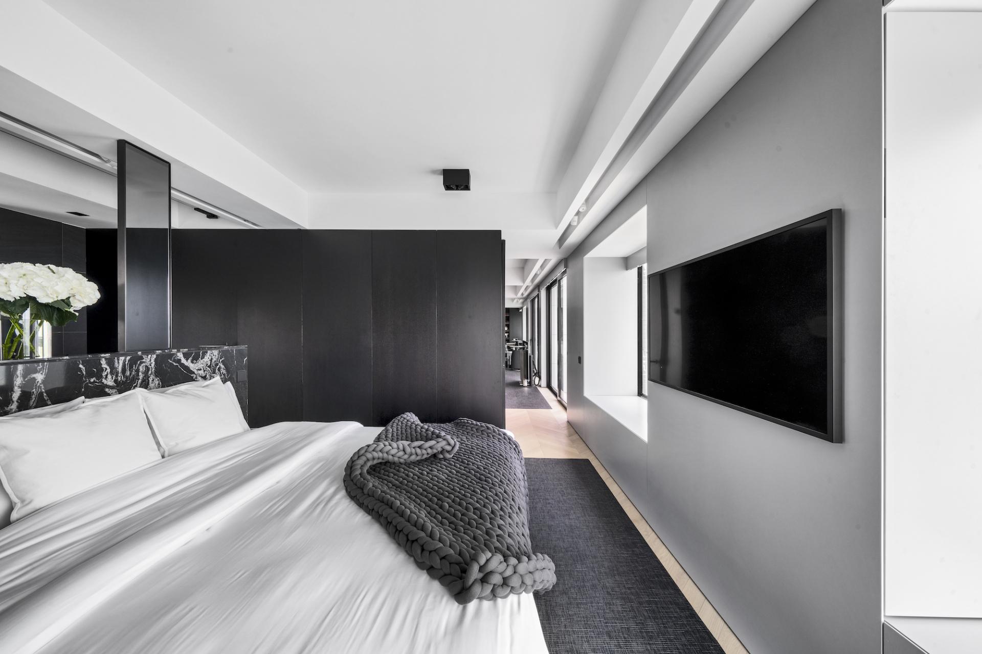 This Black and White Duplex is a Masterclass in Mono Interiors