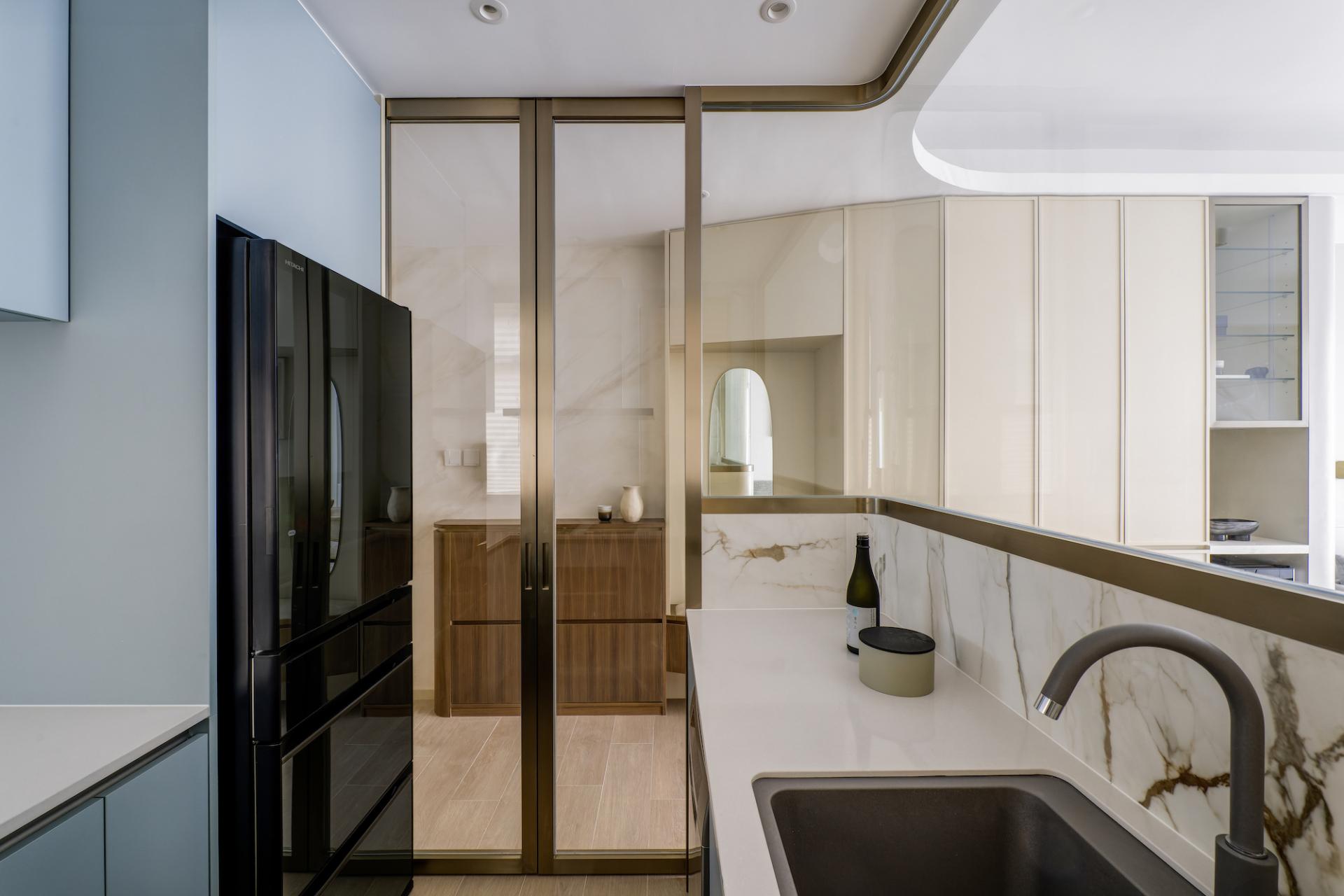 Ample Storage Space is Nicely Concealed Behind Curves in this 752 sq. ft. Quarry Bay Abode