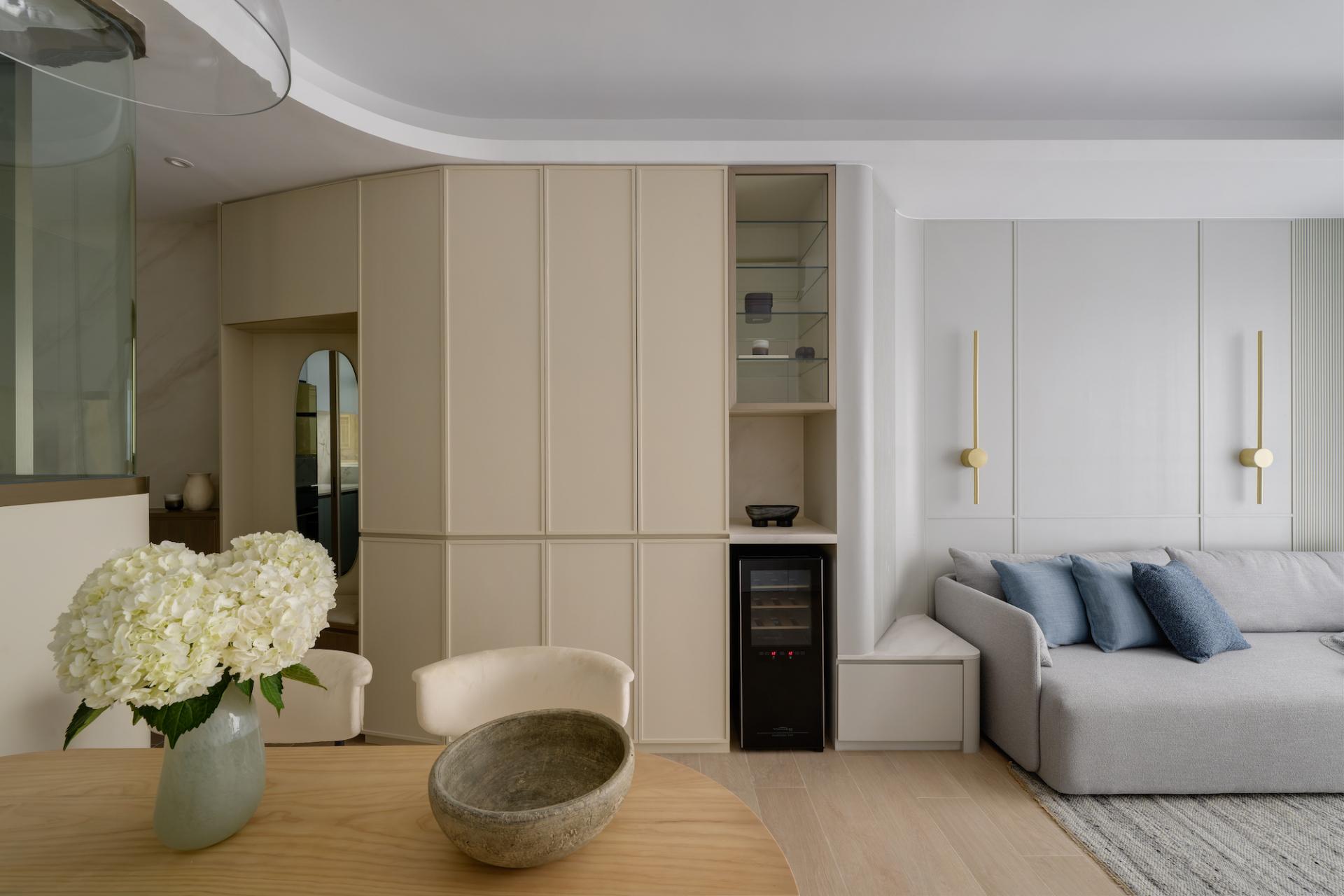 Ample Storage Space is Nicely Concealed Behind Curves in this 752 sq. ft. Quarry Bay Abode