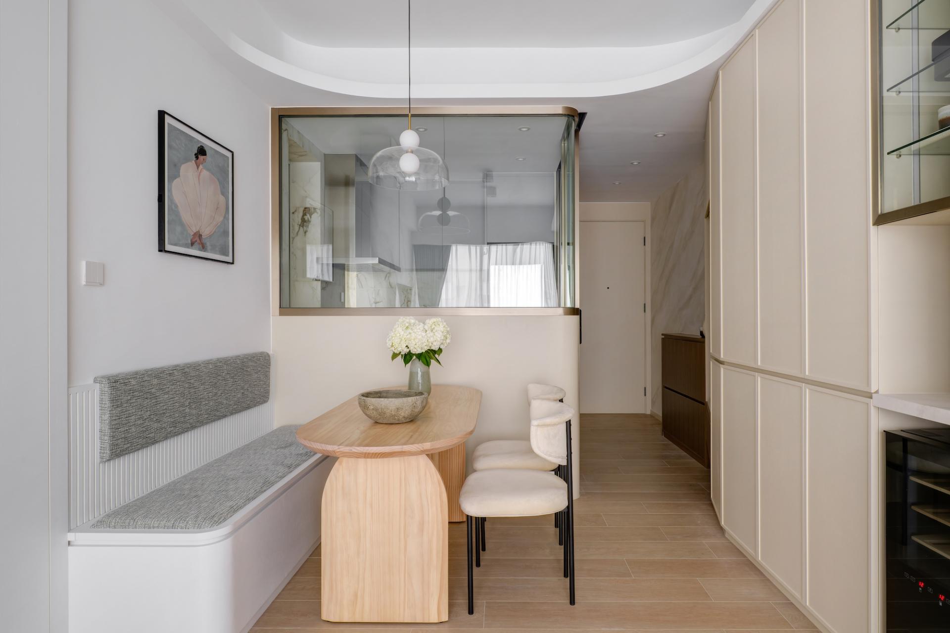 Ample Storage Space is Nicely Concealed Behind Curves in this 752 sq. ft. Quarry Bay Abode