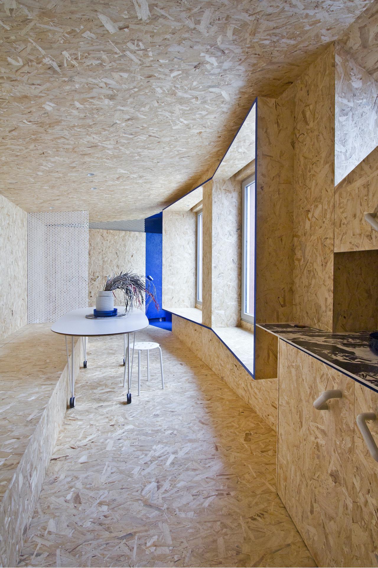 Indigo Blue and OSB Wood Come Together for a Delightful Pied-à-terre in Bergamo