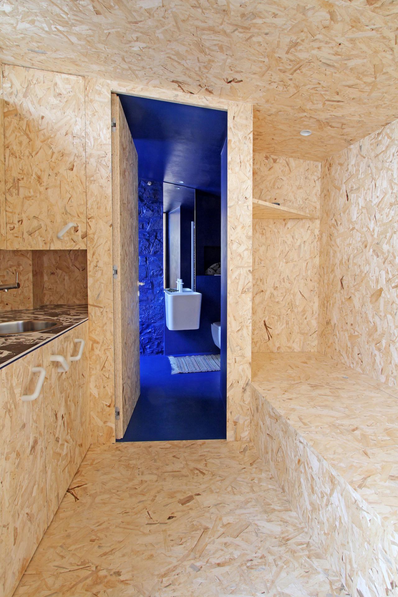 Indigo Blue and OSB Wood Come Together for a Delightful Pied-à-terre in Bergamo