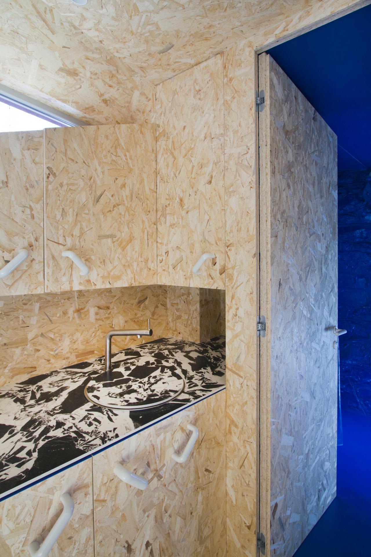 Indigo Blue and OSB Wood Come Together for a Delightful Pied-à-terre in Bergamo