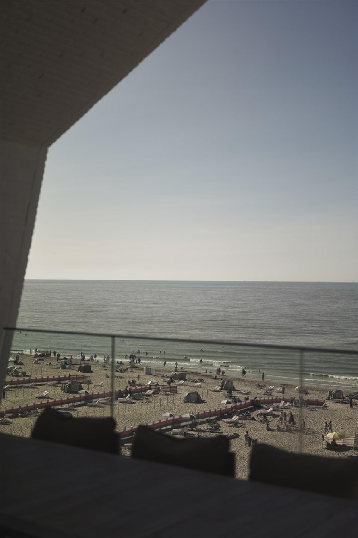 Inside a See-Through, Seaside Penthouse in Belgium