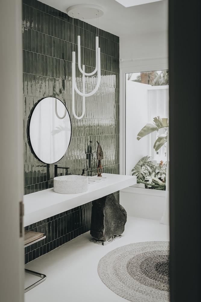 White and Green Villa in Lanzarote Blends Simplicity with Natural Beauty  