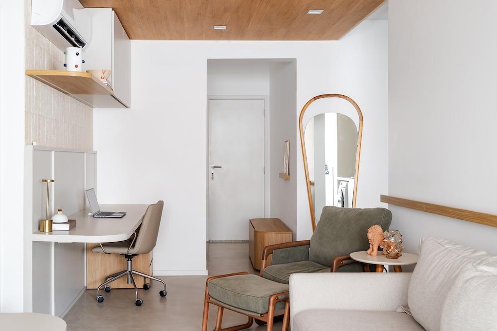 Warm Wood and Smart Reconfiguration Make for 785 Sq.ft. Solo-Living Haven 