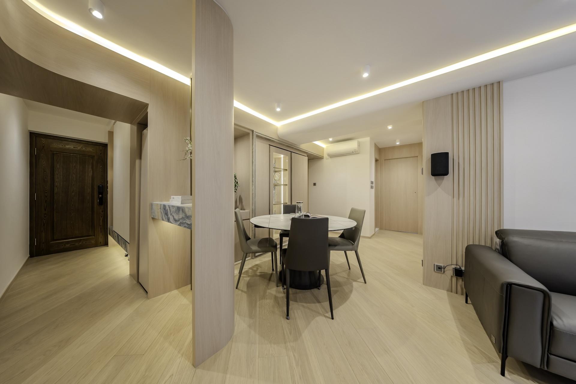 Flowing Curves and Light Wood Define this Minimalist North Point Home