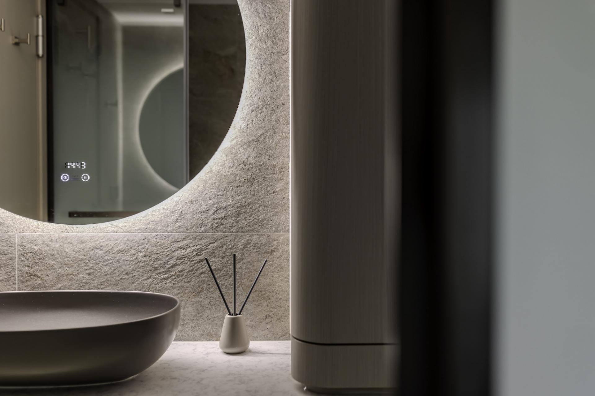 Flowing Curves and Light Wood Define this Minimalist North Point Home